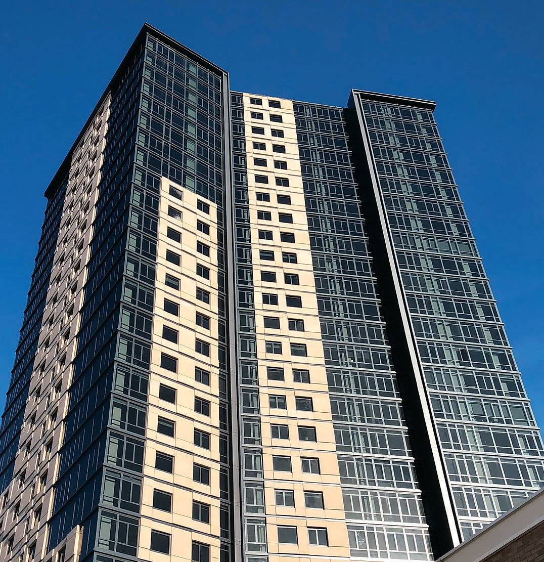 3M S70X Security Window Film installed on Huguenot Building in New York to prevent hazards from spontaneous glass breakage.