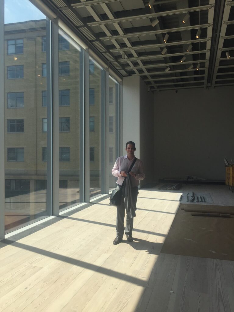 UV protection window film helping preserve artwork in gallery.