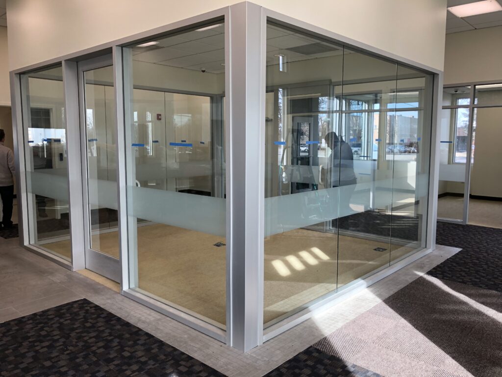 Conference Room Decorative Film – Distraction Band Decorative window film distraction band installed on conference room glass wall by Guardian Bastille.