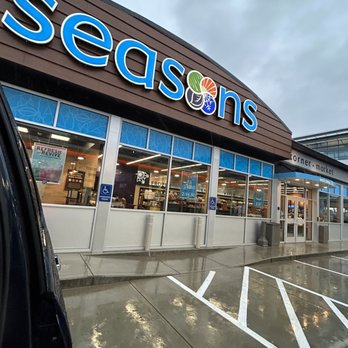 Shell Seasons convenience store storefront with non-reflective solar window film